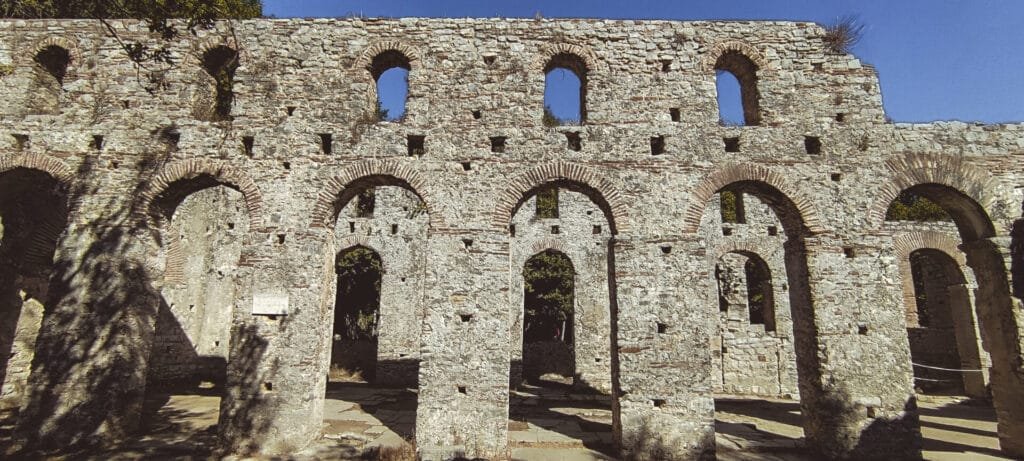 Exterior of the Basilica in Butrint, Albania, with ancient columns and ruins